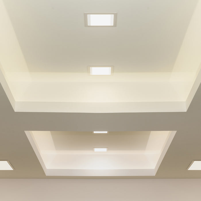A series of Square Recessed Lighting on a ceiling.