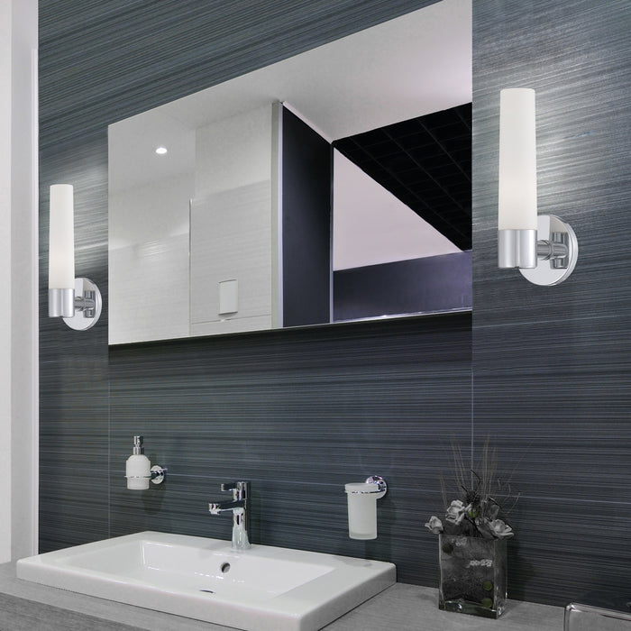 A pair of modern sconces showcased with a single vanity setup..