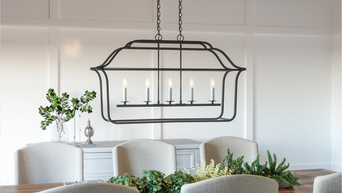 Transitional style chandelier showcased above a dining table.