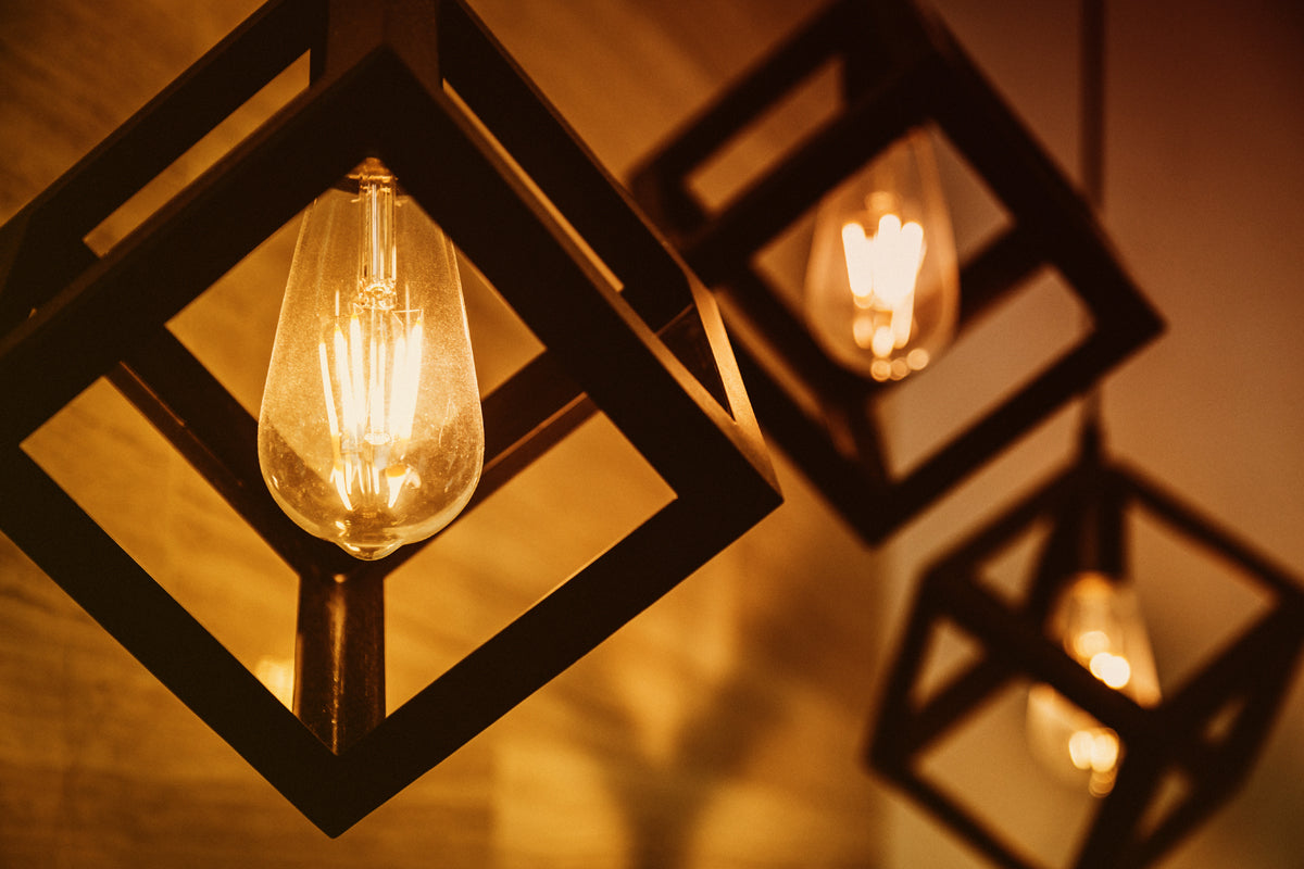 Edison style LED bulbs on pendant lights showcasing a cozy warm glow.