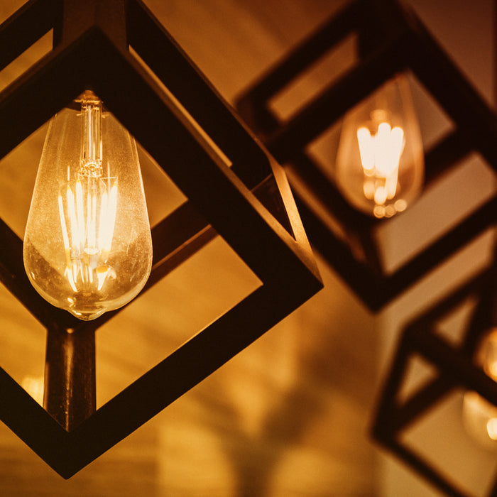 Edison style LED bulbs on pendant lights showcasing a cozy warm glow.