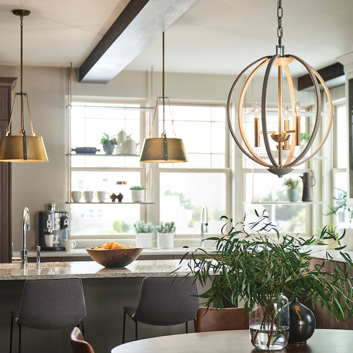 Pendant Lighting showcased above a kitchen island and a chandelier above a breakfast table.