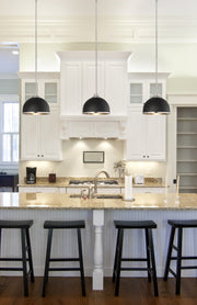 Landry 1 Light 10" Pendant in Matte Black + Brushed Nickel in a room setting
