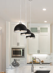 Landry 1 Light 10" Pendant in Matte Black + Chrome in a room setting