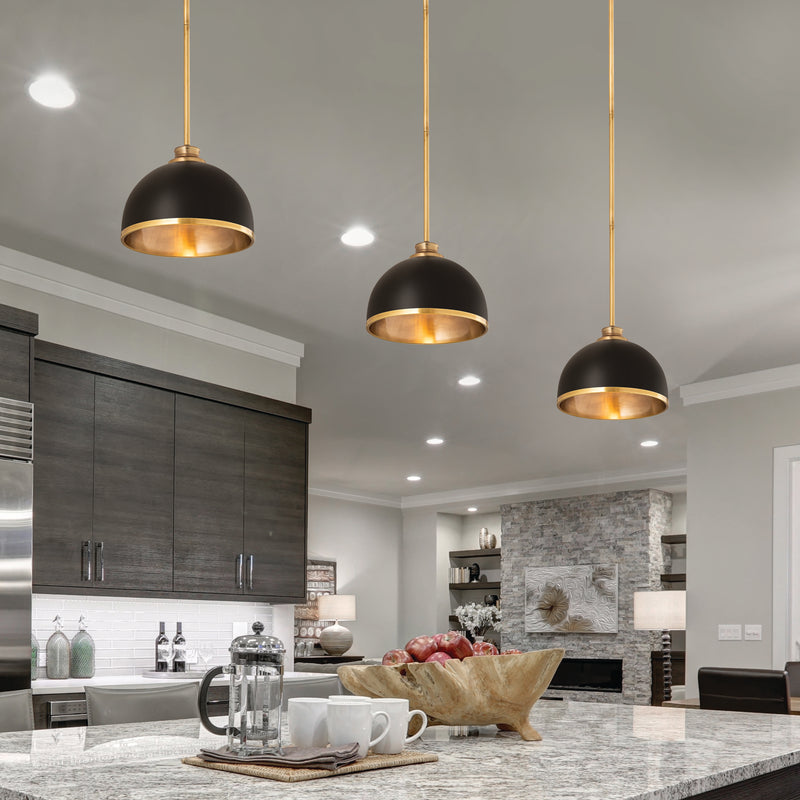 Landry 1 Light 10" Pendant in Matte Black + Rubbed Brass in a room setting