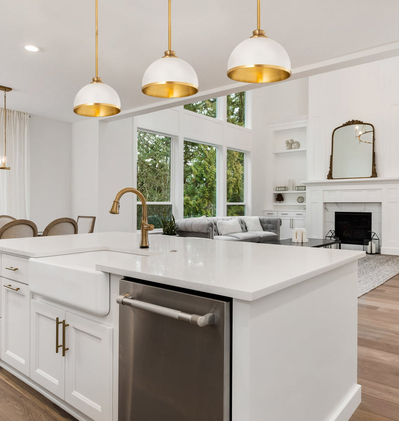 Landry 1 Light 10" Pendant in Matte White + Rubbed Brass in a room setting