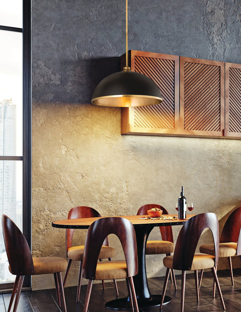Landry 1 Light 20" Pendant in Matte Black + Rubbed Brass in a room setting