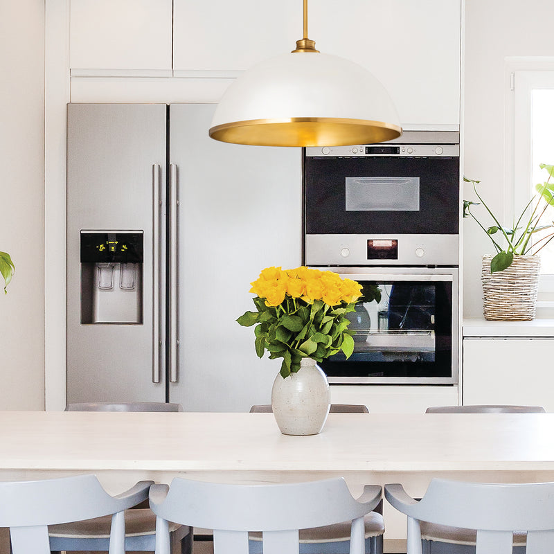 Landry 1 Light 20" Pendant in Matte White + Rubbed Brass in a room setting