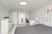 Madison 1 Light 16.5" Flush Mount in Brushed Nickel in a room setting
