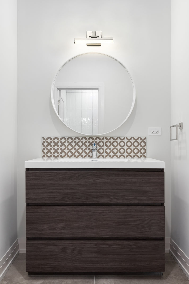 Liam 1 Light 13" Vanity in Brushed Nickel in a room setting