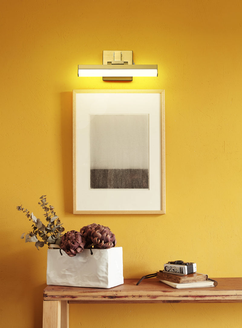 Liam 1 Light 13" Vanity in Modern Gold in a room setting