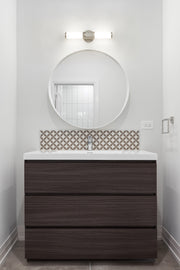 Cooper 1 Light 18" Vanity in Brushed Nickel in a room setting