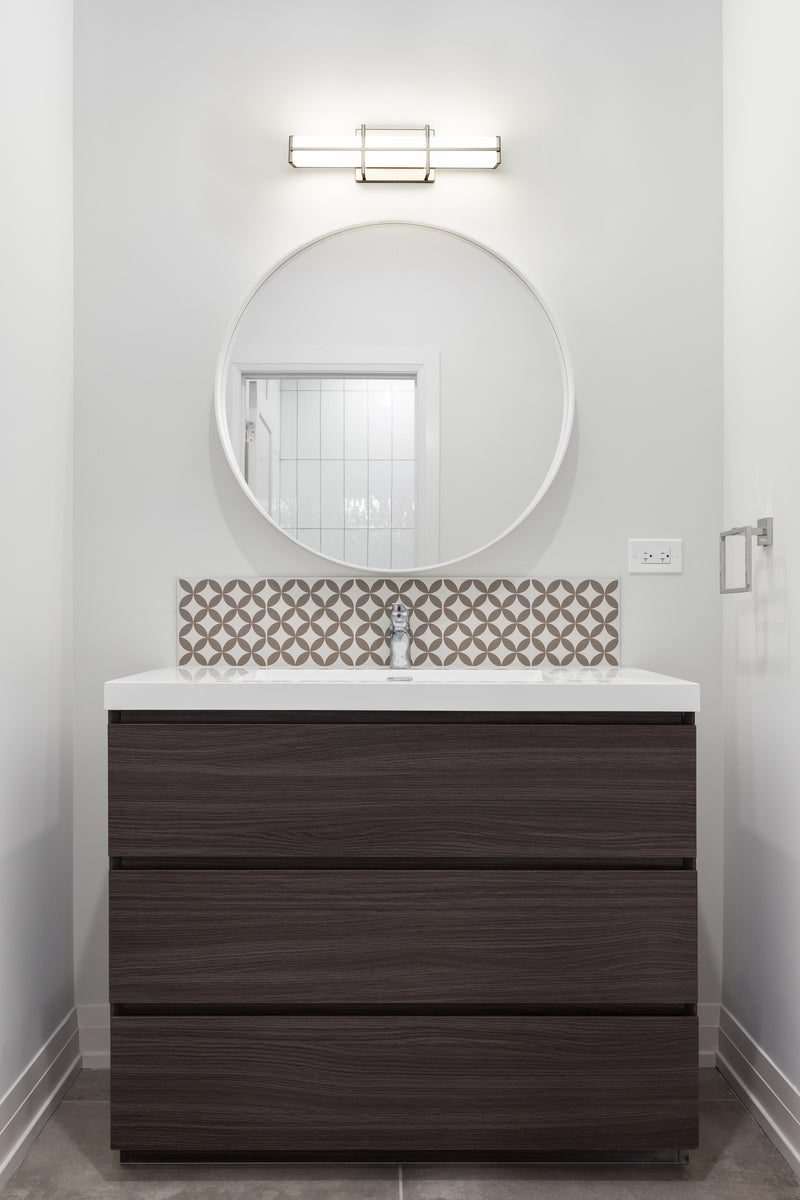 Harrison 1 Light 18" Vanity in Brushed Nickel in a room setting