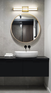 Harrison 1 Light 25" Vanity in Modern Gold in a room setting