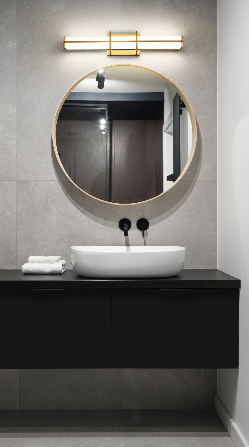 Harrison 1 Light 25" Vanity in Modern Gold in a room setting