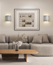 Stari 1 Light 8" Wall Sconce in Brushed Nickel in a room setting