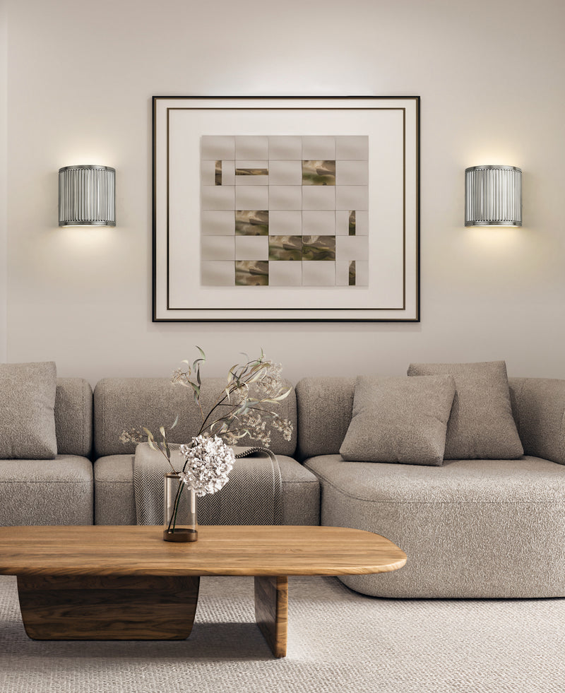 Stari 1 Light 8" Wall Sconce in Brushed Nickel in a room setting