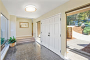 Kawan 1 Light 16" Flush Mount in Matte White + Modern Gold in a room setting