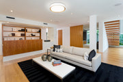 Kawan 1 Light 16" Flush Mount in Matte White + Modern Gold in a room setting