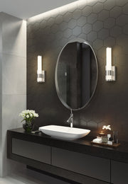 Egon 1 Light 4.75" Wall Sconce in Brushed Nickel in a room setting