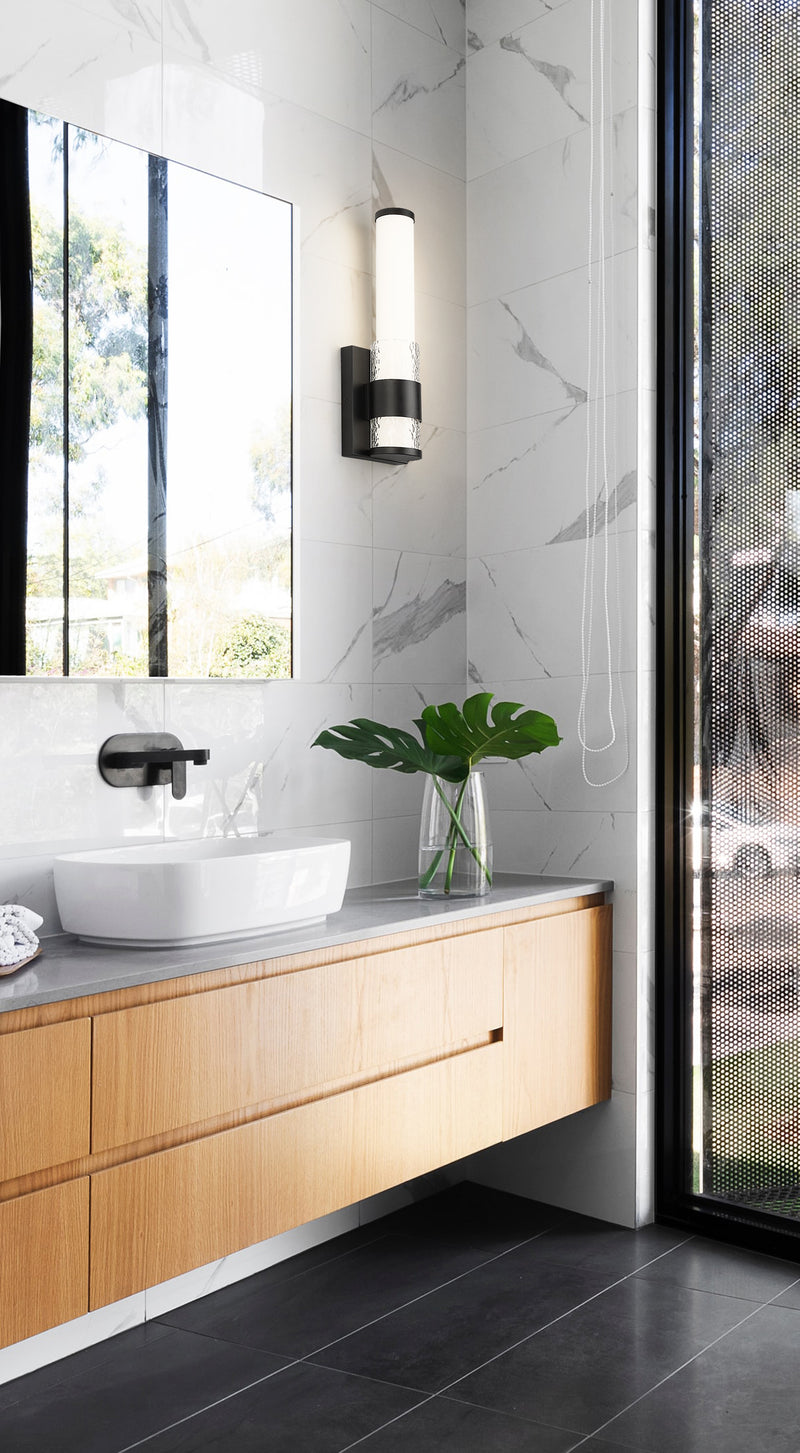 Egon 1 Light 4.75" Wall Sconce in Matte Black in a room setting