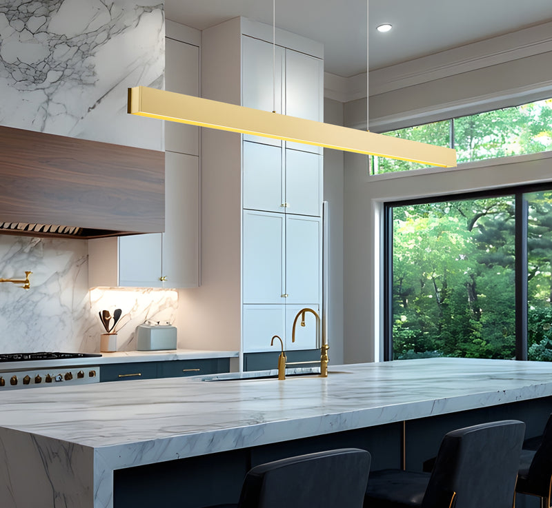 Hudson 1 Light 72" Linear Pendant in Gold in a room setting
