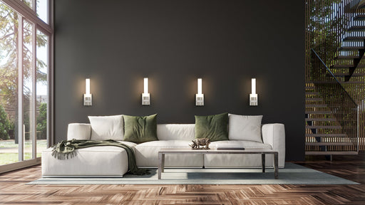 Idris 1 Light 5" Wall Sconce in Brushed Nickel in a room setting