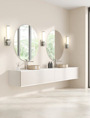 Idris 1 Light 5" Wall Sconce in Brushed Nickel in a room setting