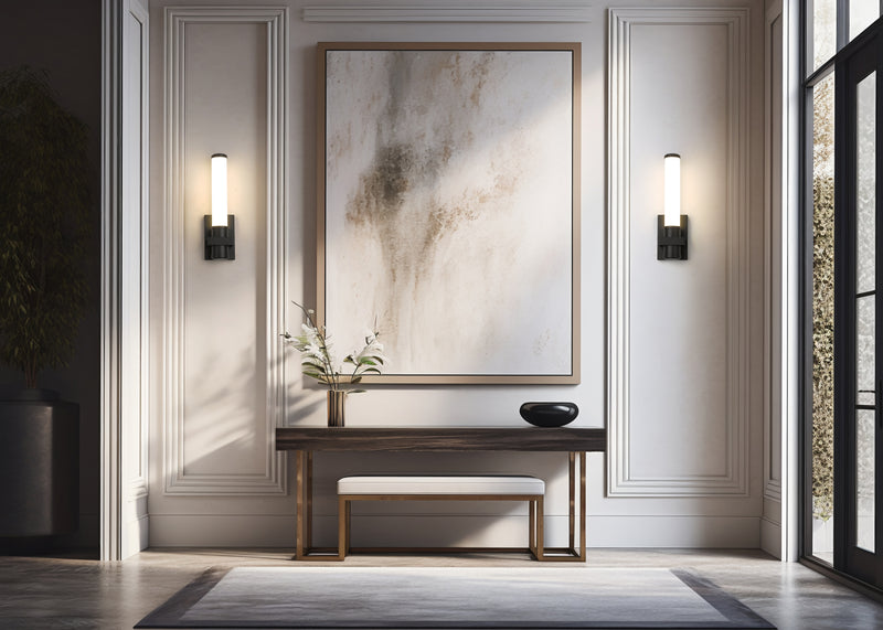 Idris 1 Light 5" Wall Sconce in Matte Black in a room setting