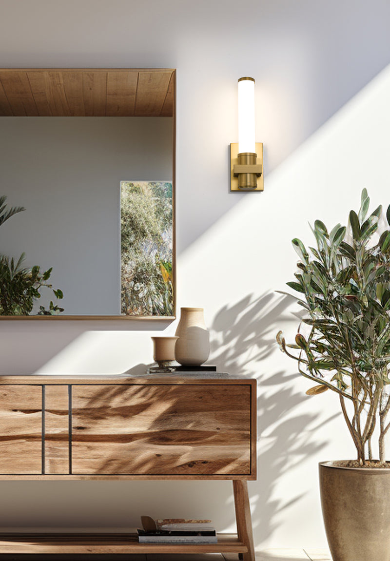 Idris 1 Light 5" Wall Sconce in Modern Gold in a room setting