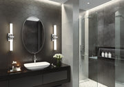 Idris 1 Light 25.5" Vanity in Chrome in a room setting
