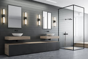 Idris 1 Light 25.5" Vanity in Matte Black in a room setting