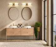 Idris 1 Light 25.5" Vanity in Modern Gold in a room setting