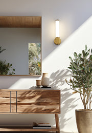 Solange 1 Light 4.75" Wall Sconce in Modern Gold in a room setting