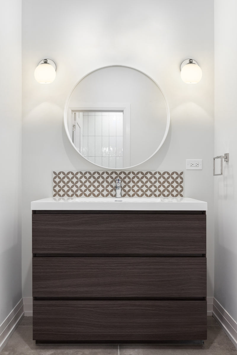 Neoma 1 Light 5.25" Wall Sconce in Brushed Nickel in a room setting
