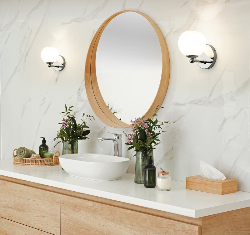 Neoma 1 Light 5.25" Wall Sconce in Chrome in a room setting
