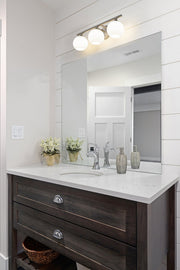 Neoma 3 Light 21.75" Vanity in Brushed Nickel in a room setting