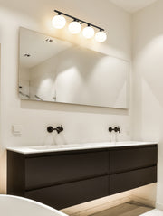 Neoma 4 Light 30" Vanity in Matte Black in a room setting