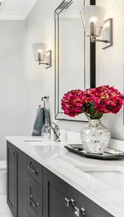 Analia 1 Light 6.5" Wall Sconce in Brushed Nickel in a room setting