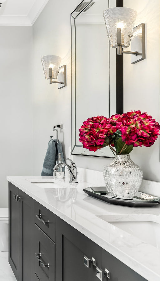 Analia 1 Light 6.5" Wall Sconce in Brushed Nickel in a room setting