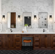 Analia 1 Light 6.5" Wall Sconce in Matte Black in a room setting