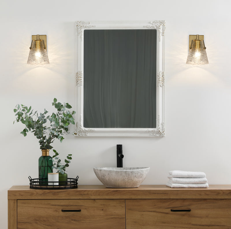Analia 1 Light 6.5" Wall Sconce in Modern Gold in a room setting