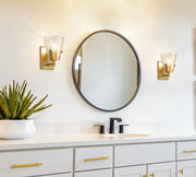 Analia 1 Light 6.5" Wall Sconce in Modern Gold in a room setting