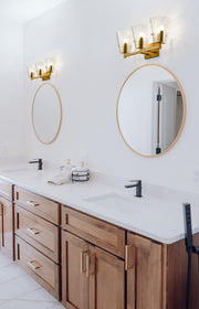 Analia 3 Light 26.25" Vanity in Modern Gold in a room setting
