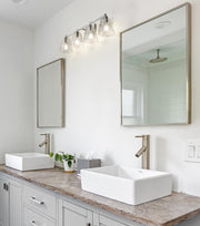 Analia 4 Light 36" Vanity in Brushed Nickel in a room setting