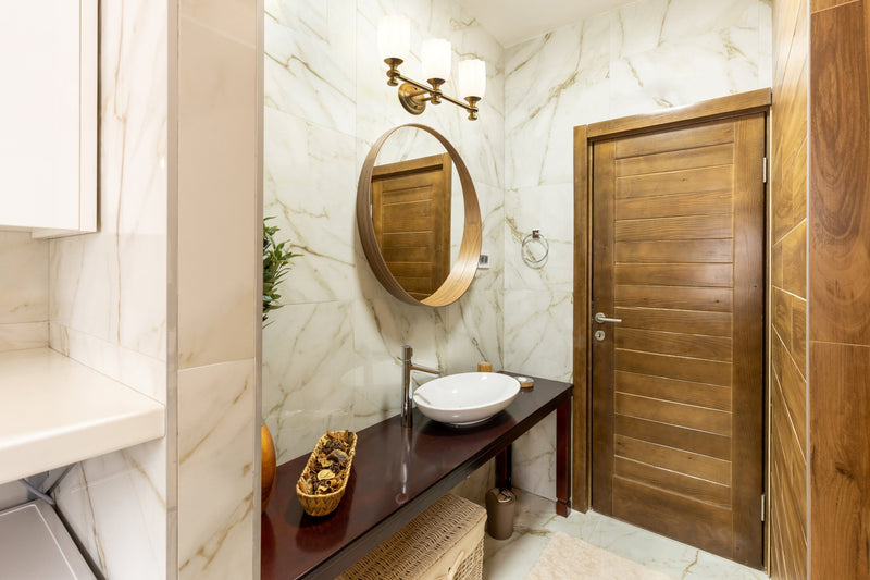 Orion 3 Light 22" Vanity in Modern Gold in a room setting