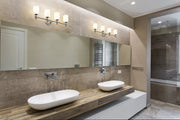 Orion 4 Light 31.25" Vanity in Brushed Nickel in a room setting