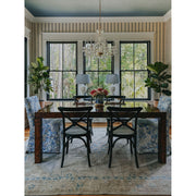 Traditional Crystal 8 Light 26" Chandelier in Polished Brass in a room setting