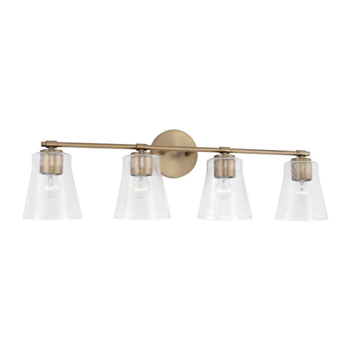 Baker Four Light Vanity in Aged Brass