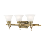 French Regency 3-Light Bath Vanity Light in Antique Brass